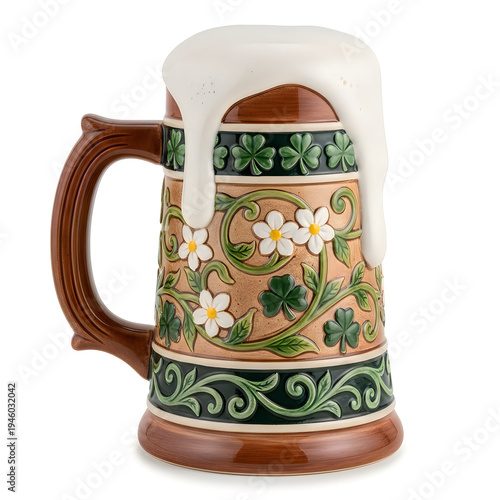 A traditional beer stein with shamrocks and flowers design