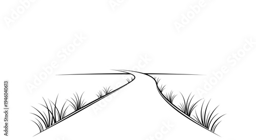 Winding road through serene landscape with grassy banks