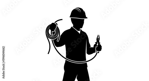 Worker holding welding torch equipment.