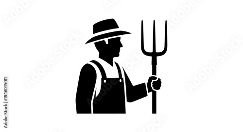 Man in overalls holding pitchfork tool.