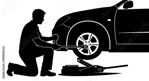Man changing a car tire.