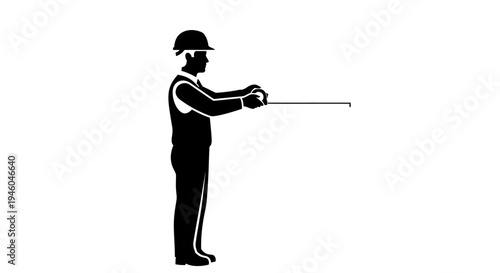 Man wearing hard hat holding tool.