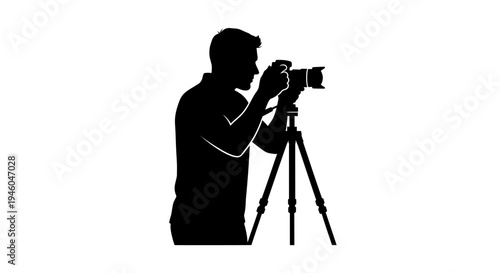 Man holding camera on tripod stand.