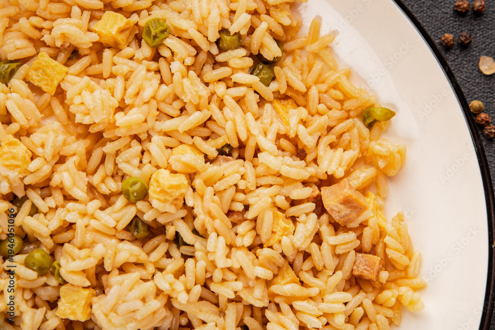 Fototapeta premium Rice with egg, chicken, and vegetables main course food preparation tasty snack fresh delicious gourmet food background on the table rustic food top view copy space vegetarian and vegan food