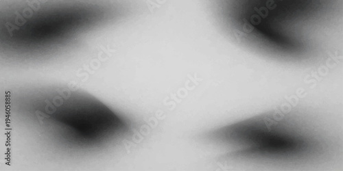 Black and white photo of a slim woman’s bare back and torso in an artistic silhouette