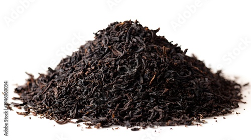 Pile of Dry Black Tea Leaves Isolated on White Background.