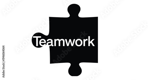 Black puzzle piece with the word teamwork written within its shape
