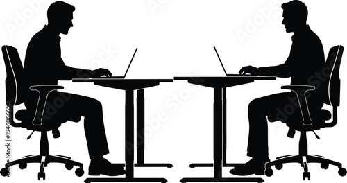 Silhouette of two professional businessmen working on laptops at modern office desks facing each other in a clean minimalist corporate environment