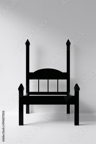 Silhouette of an Antique Bed on Light Background