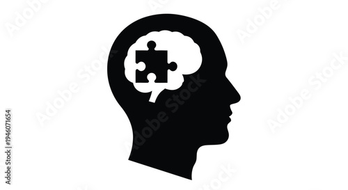Human head silhouette with a puzzle piece inside the brain area