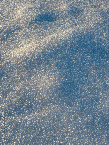 Natural snow surface texture with soft winter waves