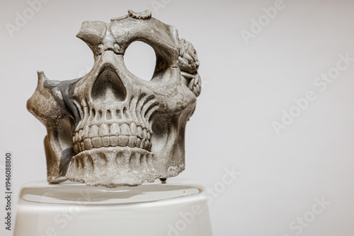 Tableau sur toile Decorative melted Skull Wax Candle on Clean Background