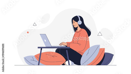 Woman Working on Laptop with Headphones, Cozy Home Office Setup with Pillows