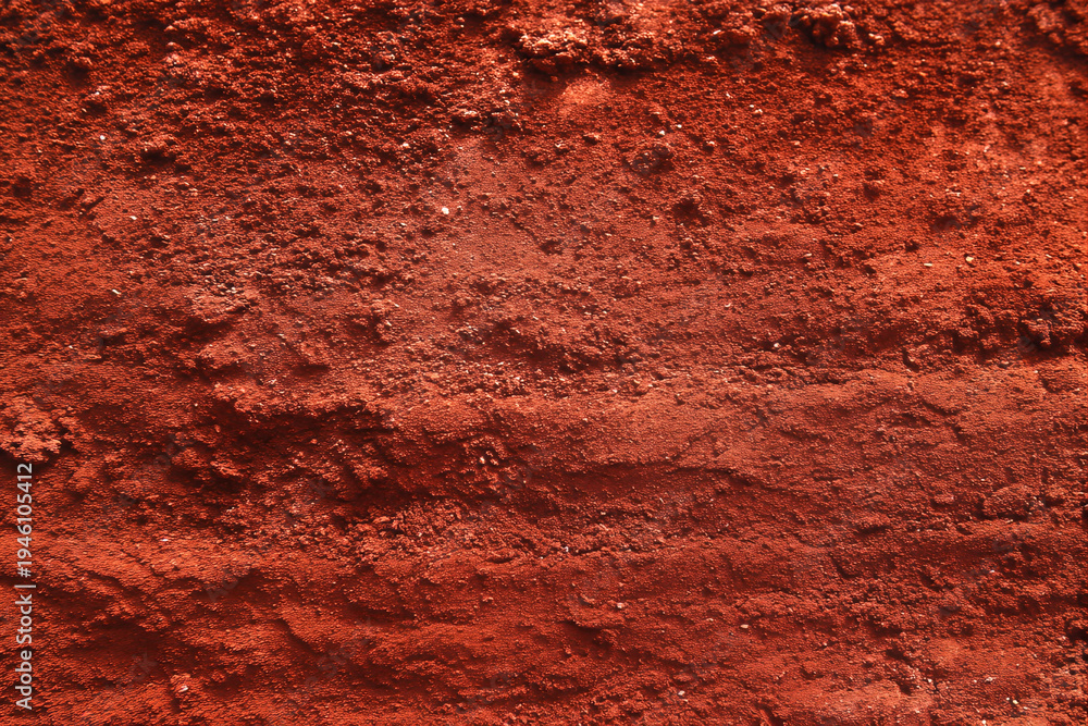 Fototapeta premium Red Clay Tennis Court Texture, Top View: Vibrant Sports Background for Athletic Designs.