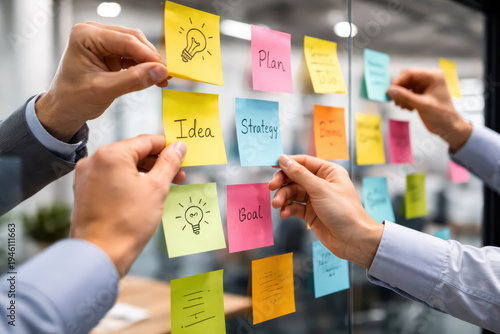 Brainstorming Planning Strategy Idea Goal Collaboration Business Office Teamwork Post it notes Hands Glass wall Meeting Creative Innovation Communication Discussion Project Work Organization Notes
