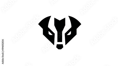 Stylized black and white badger face icon. Geometric animal head design with a fierce expression, perfect for modern mascots or logo concepts.