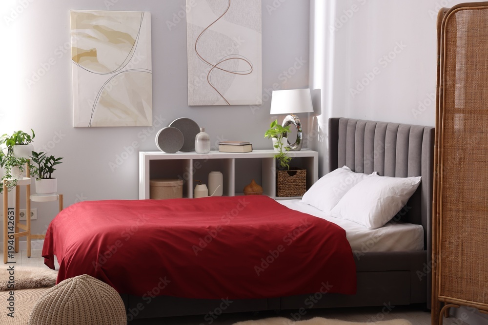 Fototapeta premium Comfortable bed with stylish linens at home. Interior design