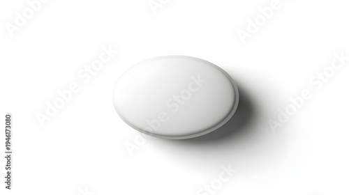 A Single White Round Pill Isolated on a White Background.