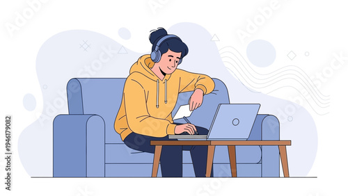 Young person with headphones working on a laptop while sitting on a couch