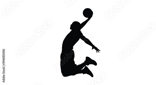 Silhouette of a professional basketball player soaring through the air preparing for a powerful slam dunk