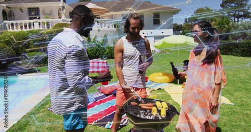 Grilling three adults wearing swimwear and coverup using charcoal grill at backyard pool with corn