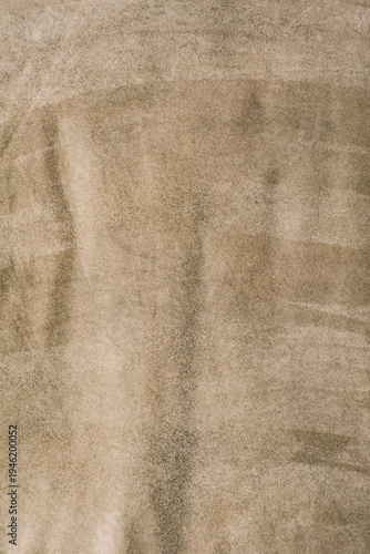 Beige suede texture macro photo as background.