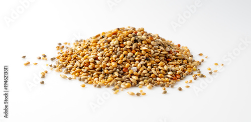 Konstfotografi Mixed bird seed for parakeets and small birds isolated on white background