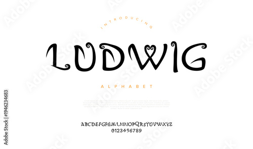 Ludwig elegant art nouveau alphabet font with curly swirl decorative ornament for vintage luxury wedding invitation
