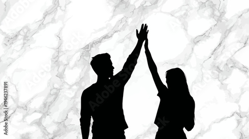 Silhouettes of a man and woman high fiving, symbolizing success, teamwork, achievement, partnership, and celebration on marble.