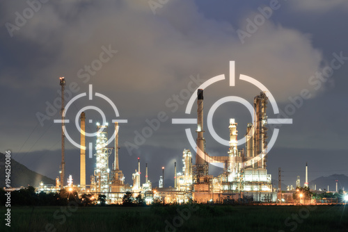 Oil refinery plant at night. Overlay  target symbol emphasize geopolitical risk and potential threats to critical energy infrastructure. Themes  of geopolitical tension and oil industry risk.