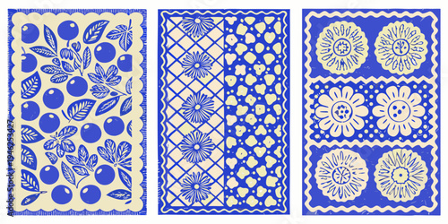 Three vintage blue and yellow patterned panels with floral and fruit motifs