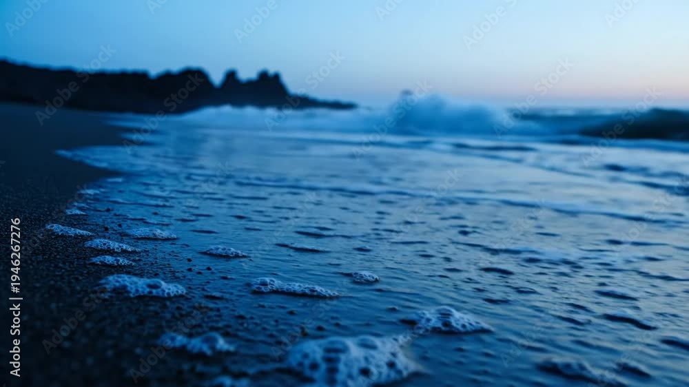 custom made wallpaper toronto digitalTranquil coastal scene: Waves gently washing up on a dark sand beach at dusk, serene seascape