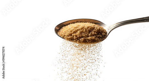 Brown sugar spilling from silver spoon on white background transparent background