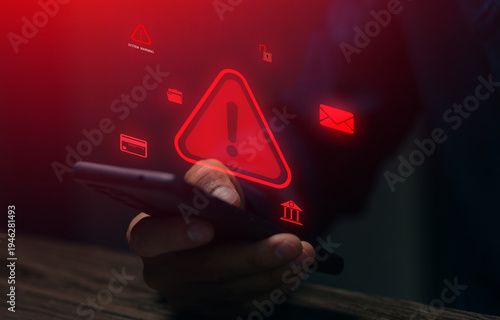 Smartphone with glowing red warning alert and security icons. Concept of cyber threat, data breach, online fraud, digital risk, cybersecurity protection and information security monitoring.