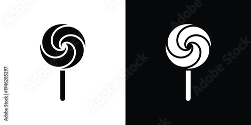 Black and white lollipop on contrasting backgrounds
