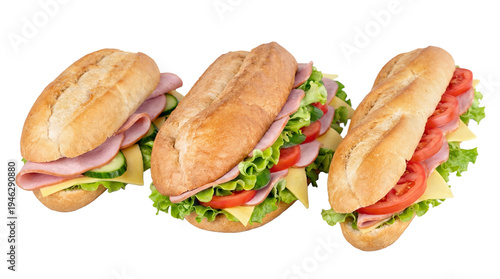 Photos Three delicious fresh sub sandwiches with ham, cheese, and crisp vegetables, photographed in a studio