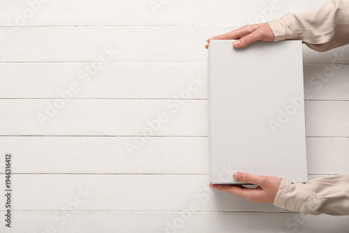 Female hands with white sho...