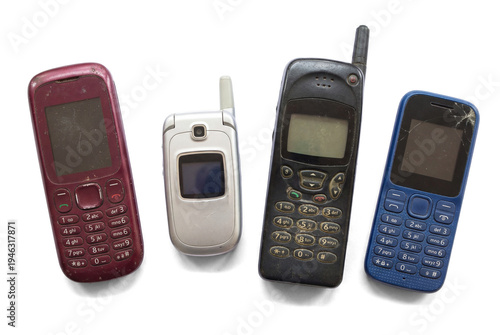 Quadro su tela A collection of four distinct, aged mobile phones, representing early generations of wireless communication technology