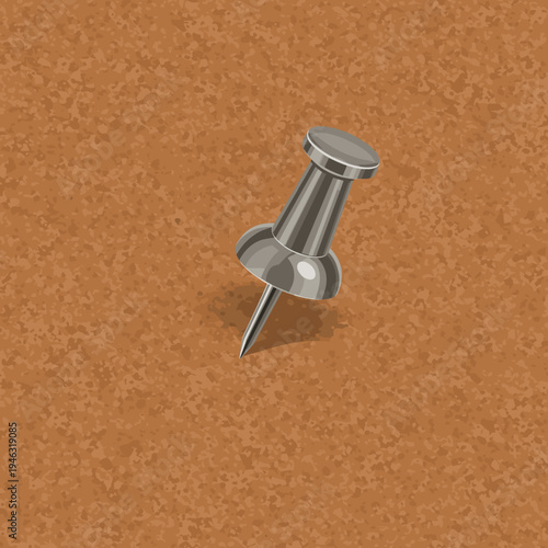 A close-up of a metallic pushpin embedded in a textured corkboard background