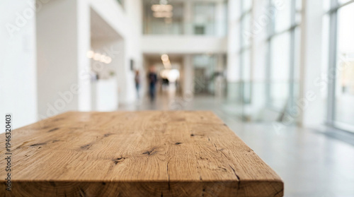 Empty room with wooden floor and window filled with natural light