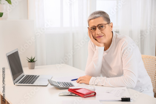 Mature woman in debt with w...