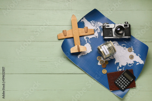 Money jar with airplane, ca...