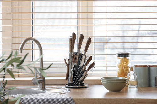 Set of knives on counter ne...