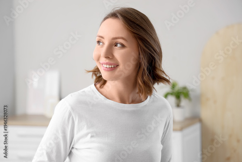 Beautiful young woman with ...
