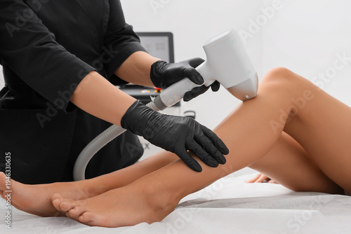 Female cosmetologist perfor...