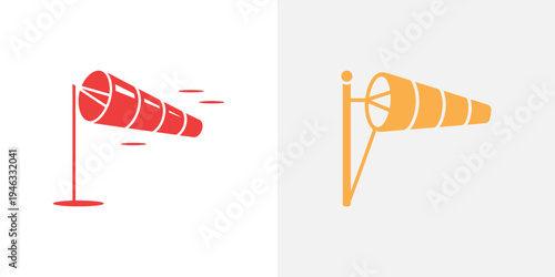 Red and orange wind socks on poles outdoor