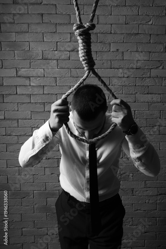 Businessman going to hang h...