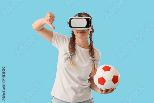 Female soccer fan in VR gla...