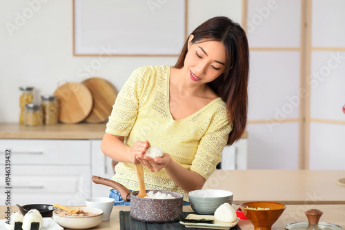 Young Asian woman preparing...