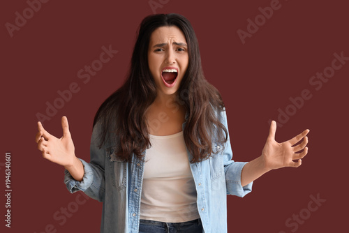 Screaming young woman on bu...